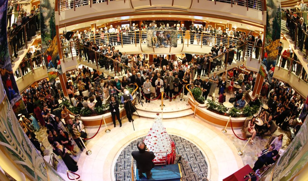 people sitting on chairs inside building